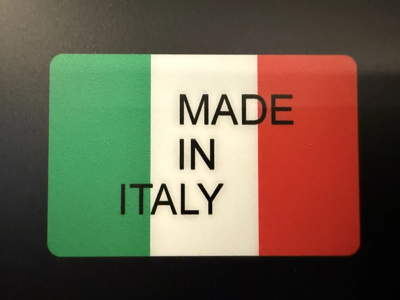 The Made in Italy plate on the oven's control column